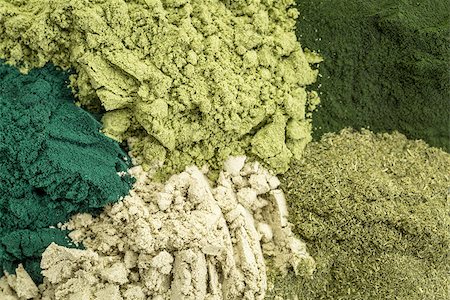 background of five healthy green dietary supplement powders (spirulina, chlorella, wheatgrass, kelp and moringa leaf) Photographie de stock - Aubaine LD & Abonnement, Code: 400-07976999