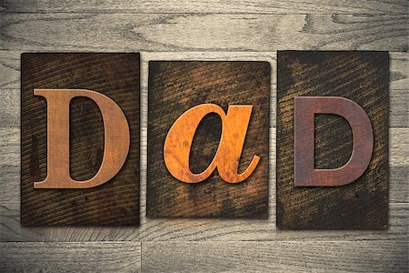 father's day - The word "DAD" written in wooden letterpress type. Photographie de stock - Aubaine LD & Abonnement, Code: 400-07977078