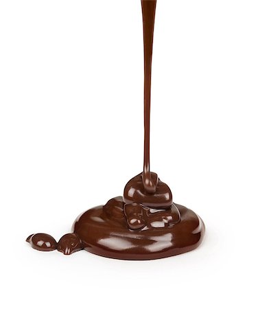 delicious chocolate is poured on a white background Photographie de stock - Aubaine LD & Abonnement, Code: 400-07977252