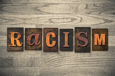 The word "RACISM" written in wooden letterpress type. Stockbilder - Microstock & Abonnement, Bildnummer: 400-07977893