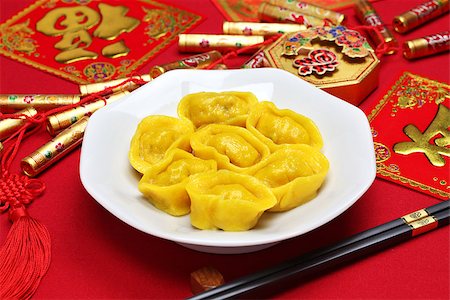 simsearch:400-07290680,k - homemade chinese gold ingot dumplings isolated on white background, new year food, spring festival food Stock Photo - Budget Royalty-Free & Subscription, Code: 400-07978740