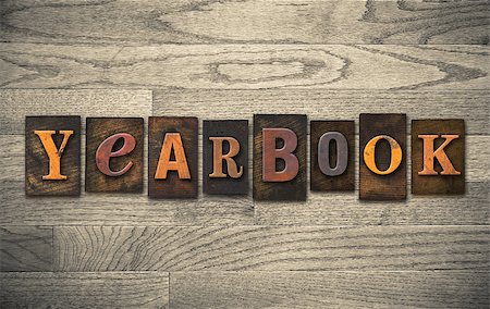 The word "YEARBOOK" written in vintage wooden letterpress type. Stock Photo - Budget Royalty-Free & Subscription, Code: 400-07979426