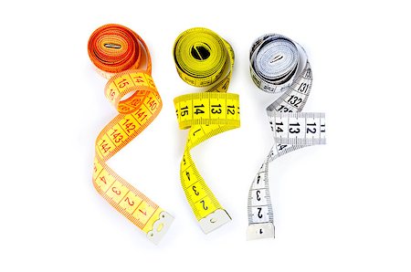 simsearch:640-01355019,k - Tape Measure isolated on white. Stock Photo - Budget Royalty-Free & Subscription, Code: 400-07971568