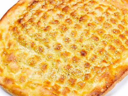 pide - Homemade traditional Turkish meal pide stuffed with meat cheese,  and sauce isolated on white background Foto de stock - Super Valor sin royalties y Suscripción, Código: 400-07972136