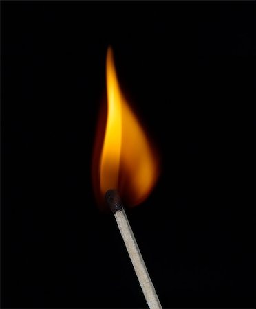simsearch:600-05810131,k - Build a fire. Lighted match on a black background Stock Photo - Budget Royalty-Free & Subscription, Code: 400-07972975