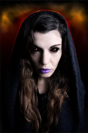 Portrait of a witch with scary eyes Foto de stock - Royalty-Free Super Valor e Assinatura, Número: 400-07973017