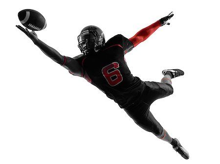 simsearch:400-07973138,k - one american football player catching ball in silhouette shadow on white background Stock Photo - Budget Royalty-Free & Subscription, Code: 400-07973127