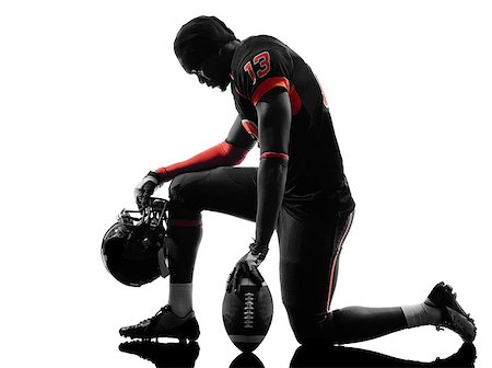 simsearch:400-07973138,k - one american football player kneeling in silhouette shadow on white background Stock Photo - Budget Royalty-Free & Subscription, Code: 400-07973128