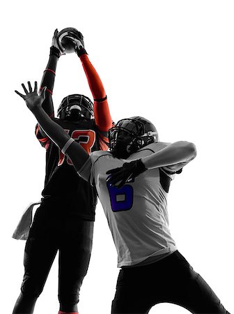 simsearch:400-07973138,k - two american football players pass action in silhouette shadow on white background Stock Photo - Budget Royalty-Free & Subscription, Code: 400-07973138