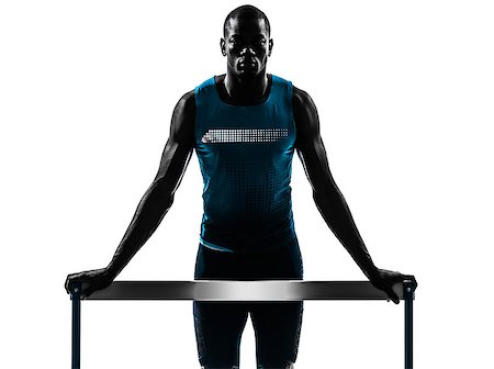 one african man hurdler runner standing in silhouette studio isolated on white background Foto de stock - Super Valor sin royalties y Suscripción, Código: 400-07973154