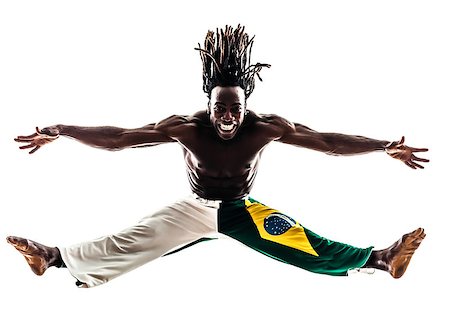 rastafarian - one Brazilian black man dancer dancing capoeira on white background Stock Photo - Budget Royalty-Free & Subscription, Code: 400-07973199