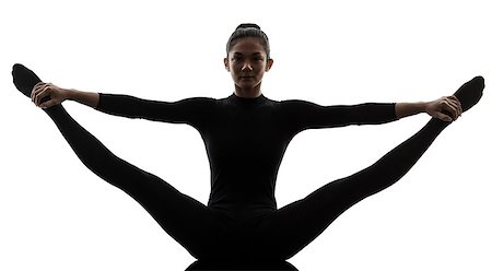 one  woman practicing gymnastic yoga stretching split in silhouette on white background Photographie de stock - Aubaine LD & Abonnement, Code: 400-07973209