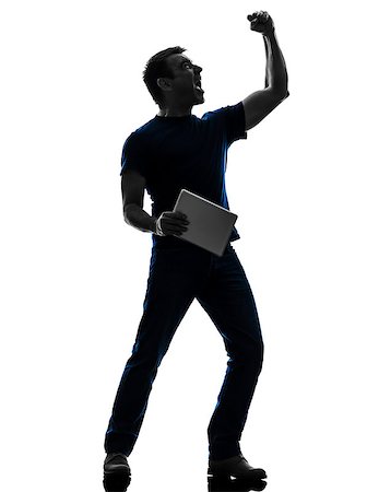 simsearch:400-08317008,k - one  man holding digital tablet in silhouette on white background Stockbilder - Microstock & Abonnement, Bildnummer: 400-07973296