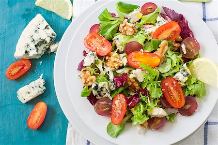 simsearch:400-04293911,k - fresh salad with nut grapes and blue cheese on white plate Stock Photo - Budget Royalty-Free & Subscription, Code: 400-07973428