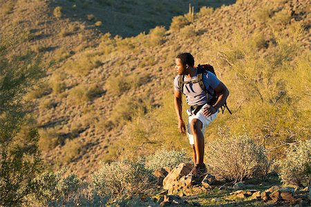 desert hikers - Young man hiking outdoors on a trail at Phoenix Sonoran Preserve in Phoenix, Arizona. Stock Photo - Budget Royalty-Free & Subscription, Code: 400-07973611