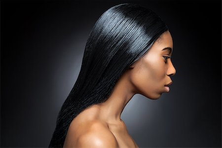 simsearch:400-06179308,k - Profile of an young black beauty with long straight and shiny hair Stock Photo - Budget Royalty-Free & Subscription, Code: 400-07984005