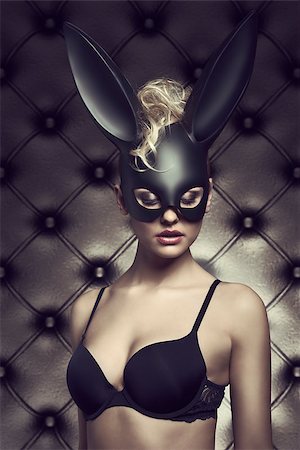 Sexy blonde woman with curly hair-style posing in sexy lingerie with  black bunny carnival mask. Gothic Easter Stock Photo - Budget Royalty-Free & Subscription, Code: 400-07984452