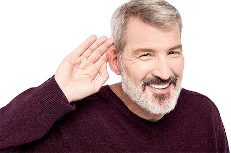 Mature man cupping hand behind ear Stock Photo - Budget Royalty-Free & Subscription, Code: 400-07984763