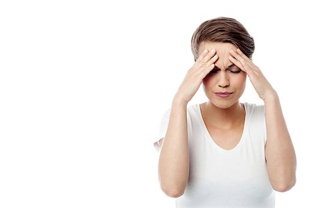 simsearch:400-04978521,k - Frustrated woman holding her head, painful. Stock Photo - Budget Royalty-Free & Subscription, Code: 400-07985366