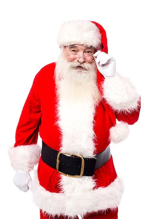 Father christmas looking into the camera Stock Photo - Budget Royalty-Free & Subscription, Code: 400-07985477