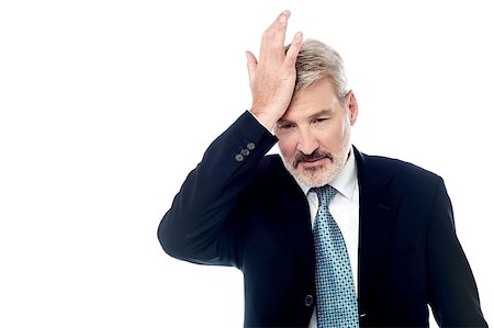 simsearch:400-04204942,k - Businessman slapping hand on head, realizes mistake. Stock Photo - Budget Royalty-Free & Subscription, Code: 400-07985488