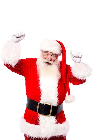 Happy santa posing to camera with raised hands Stock Photo - Budget Royalty-Free & Subscription, Code: 400-07985483