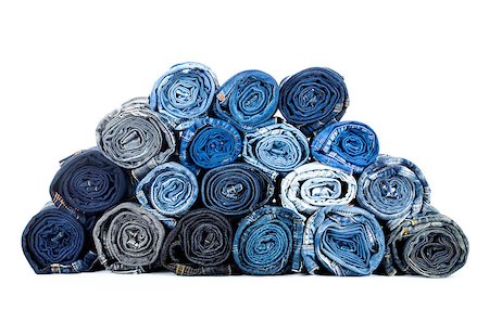 rolled jeanses isolated on a white background Photographie de stock - Aubaine LD & Abonnement, Code: 400-07985775