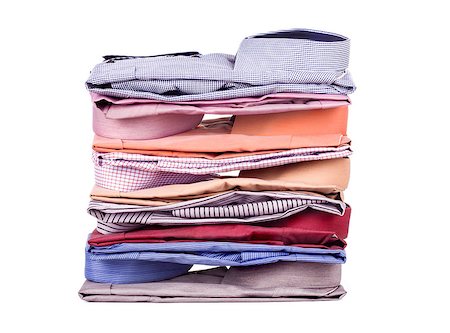 simsearch:640-03260502,k - Stacks of many colored clothes isolated on a white background Stock Photo - Budget Royalty-Free & Subscription, Code: 400-07985783