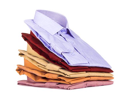 simsearch:640-03260502,k - Stacks of many colored clothes isolated on a white background Stock Photo - Budget Royalty-Free & Subscription, Code: 400-07985794