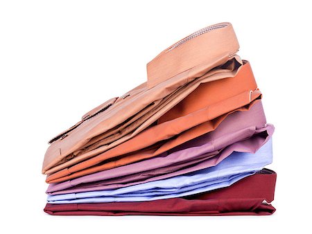 simsearch:640-03260502,k - Stacks of many colored clothes isolated on a white background Stock Photo - Budget Royalty-Free & Subscription, Code: 400-07985790