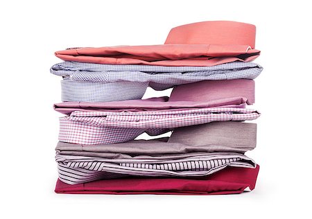 simsearch:640-03260502,k - Stacks of many colored clothes isolated on a white background Stock Photo - Budget Royalty-Free & Subscription, Code: 400-07985792