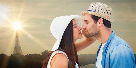 retro french - Happy hipster couple about to kiss against eiffel tower Stock Photo - Budget Royalty-Free & Subscription, Code: 400-07986128