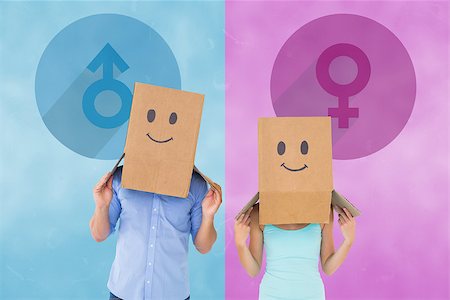 Couple wearing emoticon face boxes on their heads against female gender symbol Stock Photo - Budget Royalty-Free & Subscription, Code: 400-07986161