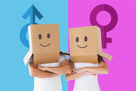 Couple wearing smiley face boxes on their heads against female gender symbol Stock Photo - Budget Royalty-Free & Subscription, Code: 400-07986163