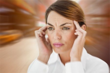 Woman with headache against blurry new york street Stock Photo - Budget Royalty-Free & Subscription, Code: 400-07986293