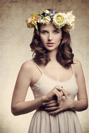 simsearch:400-07986693,k - Beautiful, brunette woman with colorful makeup, wreath of flowers on head, little bird on her finger. Stock Photo - Budget Royalty-Free & Subscription, Code: 400-07986698