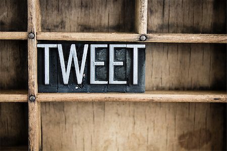 The word "TWEET" written in vintage metal letterpress type in a wooden drawer with dividers. Stock Photo - Budget Royalty-Free & Subscription, Code: 400-07986872