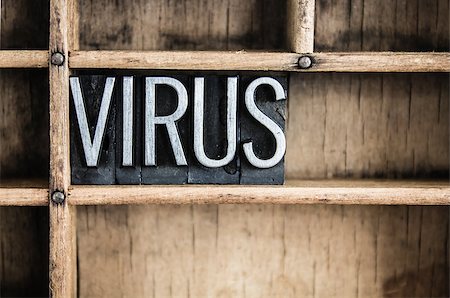 The word "VIRUS" written in vintage metal letterpress type in a wooden drawer with dividers. Photographie de stock - Aubaine LD & Abonnement, Code: 400-07986873