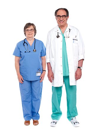 simsearch:400-05745246,k - Two senior male and female physicians standing in front of camera Photographie de stock - Aubaine LD & Abonnement, Code: 400-07986999
