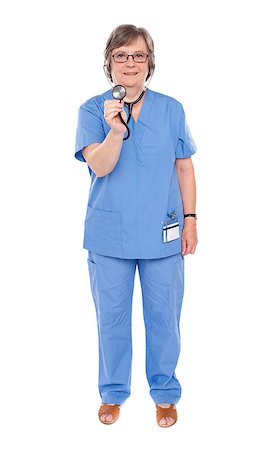 doctor checking full body - Full length portrait of senior lady doctor posing with stethoscope Stock Photo - Budget Royalty-Free & Subscription, Code: 400-07987005