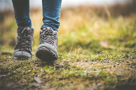 feet in shoes on a forest path Stock Photo - Budget Royalty-Free & Subscription, Code: 400-07988086