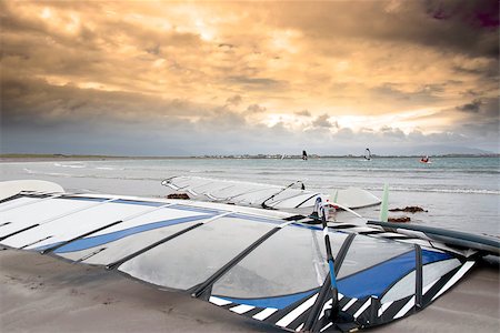 wind surfers braving the storm winds on the wild atlantic way in county Kerry Ireland Foto de stock - Royalty-Free Super Valor e Assinatura, Número: 400-07988185