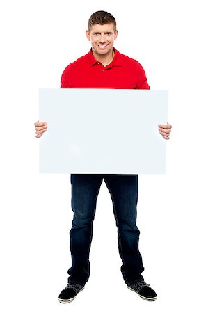 simsearch:400-06695536,k - Handsome guy presenting blank billboard to camera isolated against white background Stock Photo - Budget Royalty-Free & Subscription, Code: 400-07988542