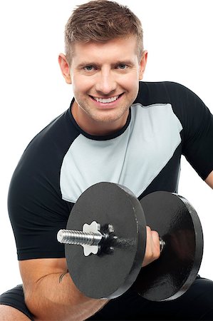 simsearch:400-06859184,k - Closeup shot of masculine man doing biceps with dumbbell Photographie de stock - Aubaine LD & Abonnement, Code: 400-07988602