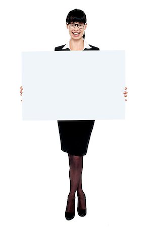 Full length portrait of business executive holding blank whiteboard Stock Photo - Budget Royalty-Free & Subscription, Code: 400-07988685