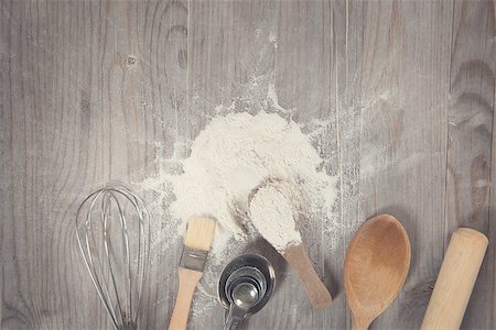 Baking tools from overhead view on wooden table in vintage tone, copy space on top. Stock Photo - Budget Royalty-Free & Subscription, Code: 400-07989901