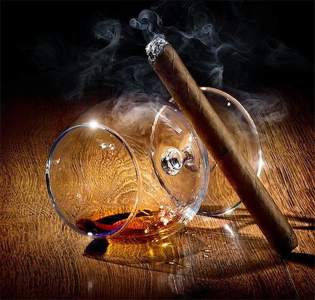 Cigar and almost empty glass of cognac Stock Photo - Budget Royalty-Free & Subscription, Code: 400-07981299