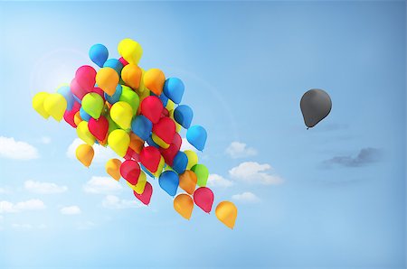 Concept of separations. Discrimination. One balloon is separated from the group. Incorrect direction. Stock Photo - Budget Royalty-Free & Subscription, Code: 400-07981449