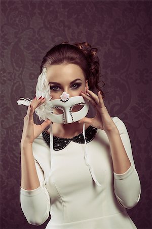 simsearch:400-07981805,k - vintage portarit of elegant woman in white with carnival mask . she is posing at the camera . Stock Photo - Budget Royalty-Free & Subscription, Code: 400-07982047