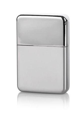 Silver lighter isolated on a white background Photographie de stock - Aubaine LD & Abonnement, Code: 400-07982875